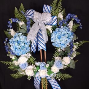 Light blue hydrangea wreath with icy blue roses and glittery blue white and silver ribbons – hand-made artificial wreath by Shamitay
