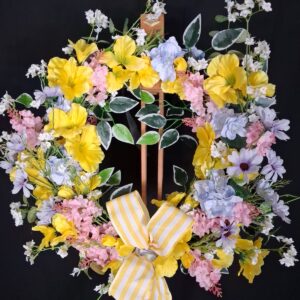 Yellow lily mixed floral wreath with pink and blue blooms and a yellow and white striped bow – hand-made artificial wreath by Shamitay