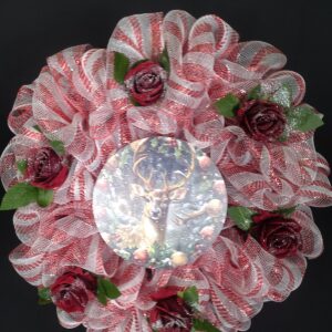 Red and white candy-stripe deco mesh wreath with winter stag centre plaque and frosted burgundy roses – hand-made artificial wreath by Shamitay